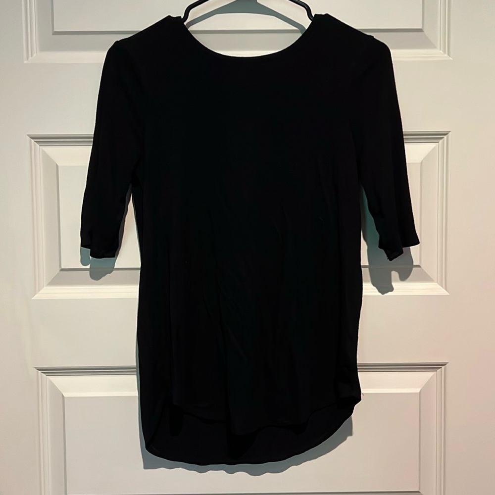 Plain black shirt w/ mid length sleeve
